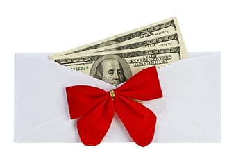 California employee reviewing unpaid bonus with employment attorney